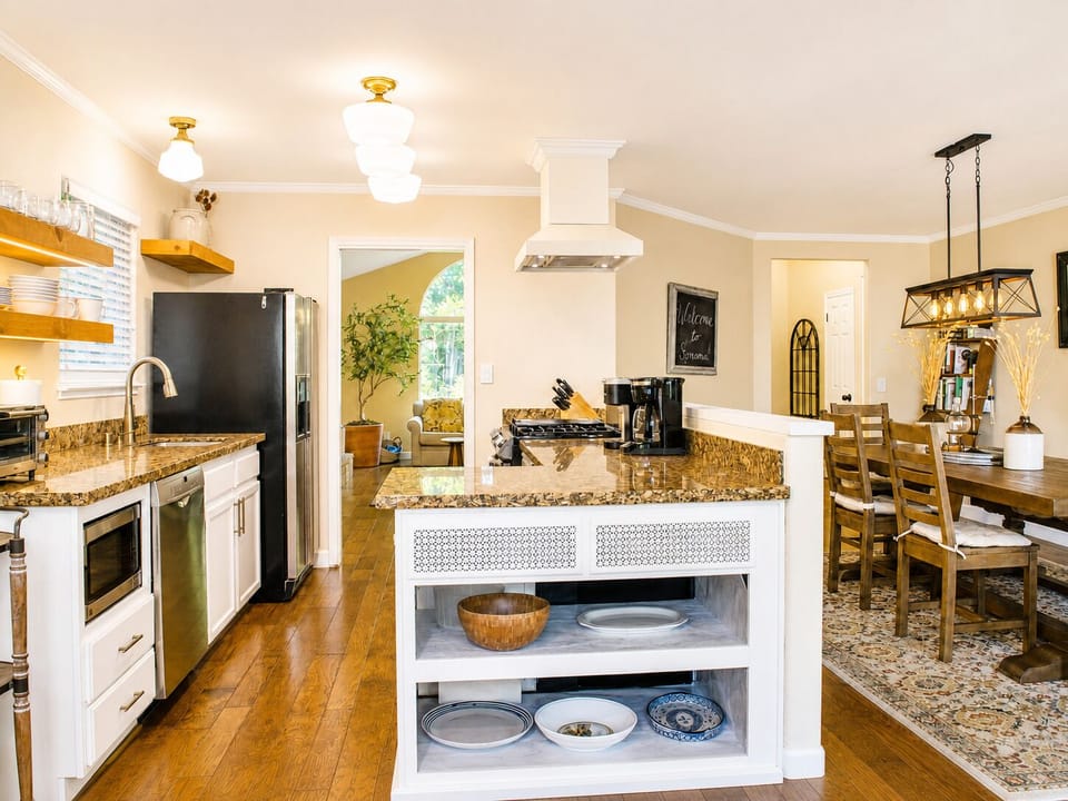 Chef's kitchen opens out to dining room and living room