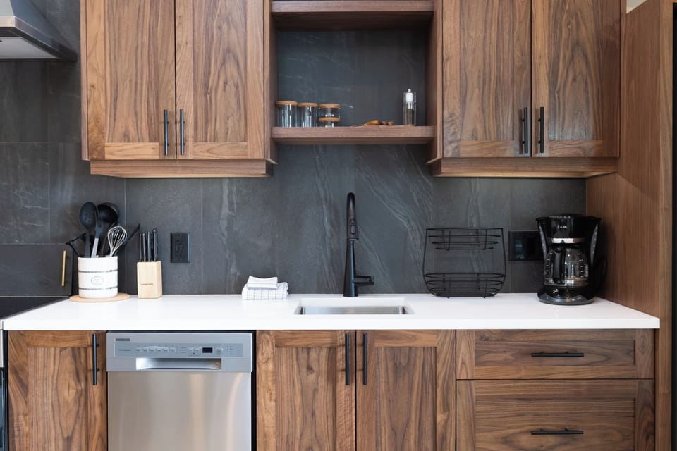 The kitchen has a d/washer, drip coffee maker or french press, kettle & toaster.