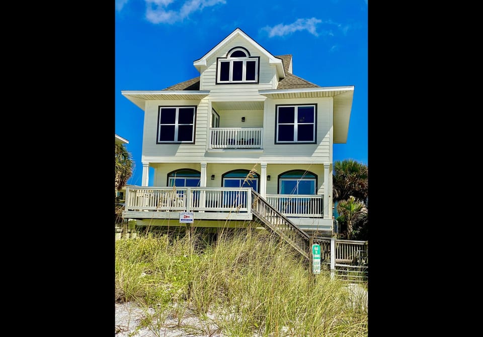 Beach Side of House will full lower level deck, bar-be-que, seating for 12