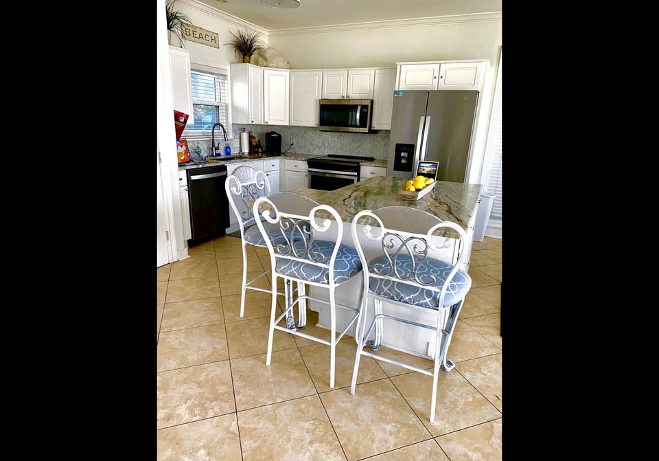 Breakfast area with 3 comfy stools