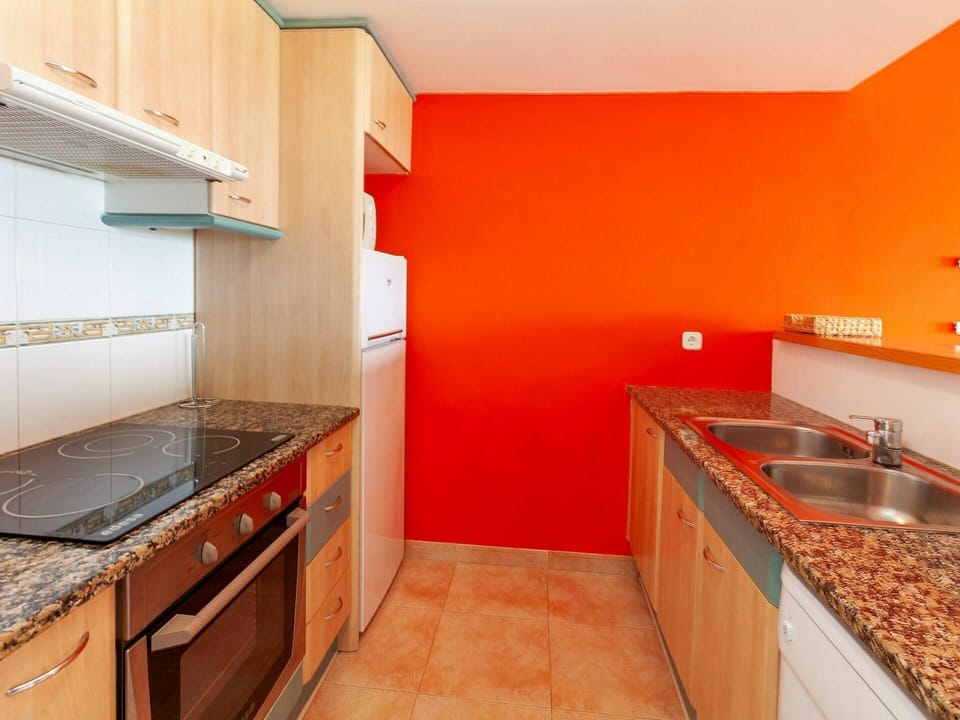 Cabinetry, Kitchen Sink, Countertop, Sink, Plumbing Fixture, Property, Tap, Kitchen, Kitchen Stove, Orange