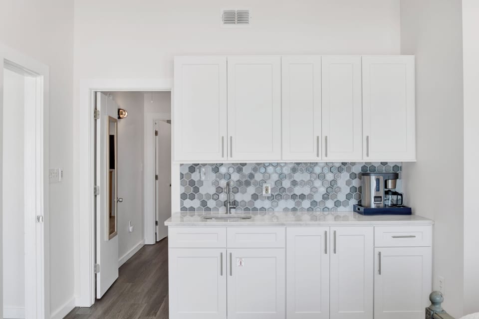 Bedroom 2 has a wet bar with a sink and coffee maker for your convenience
