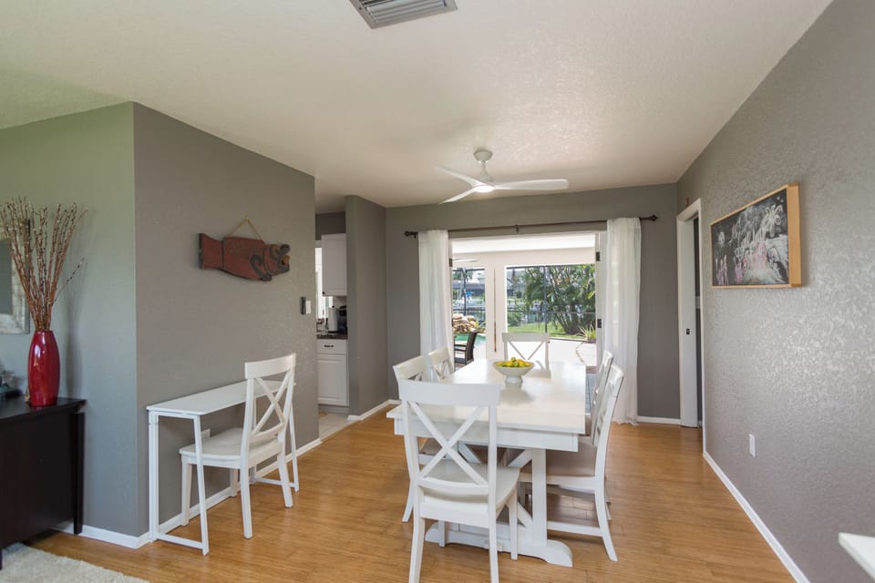 Dining table looking out to the canal expands to seat 10