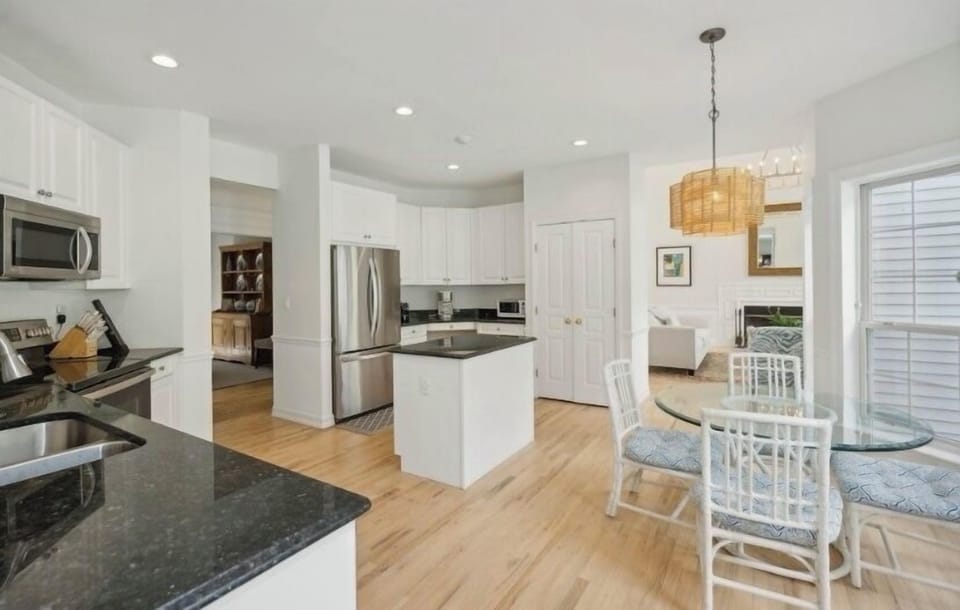 The kitchen is well stocked with cookware, kitchenware and utensils.