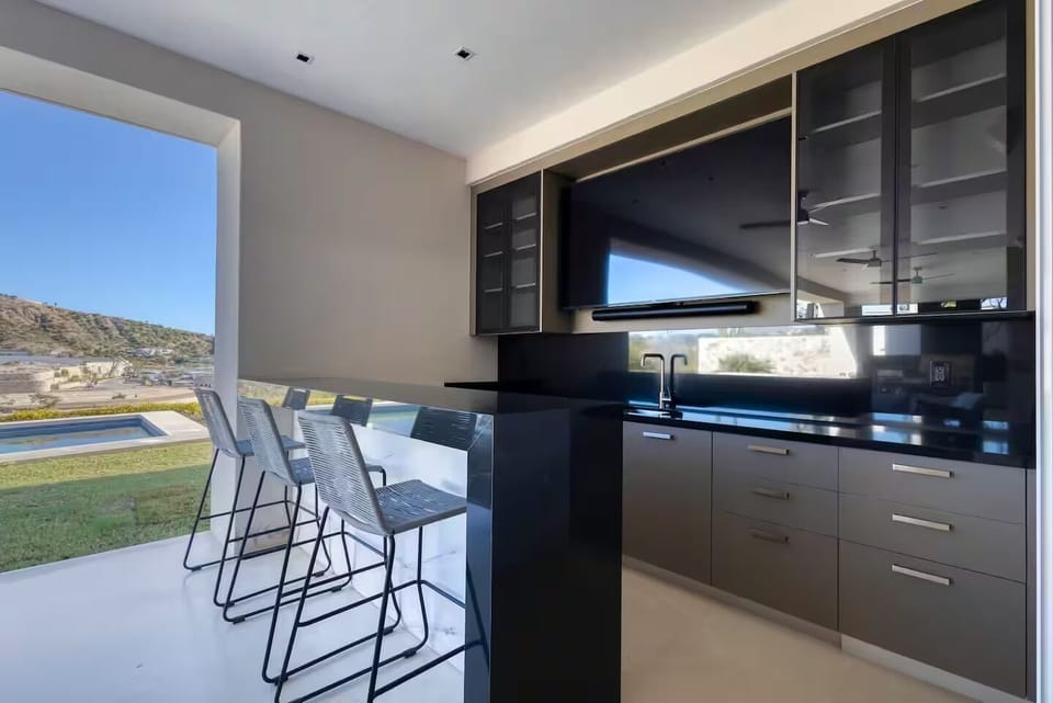Outdoor Bar with 75" Sony TV and Sonos Surround Sound. Complete with kitchenette