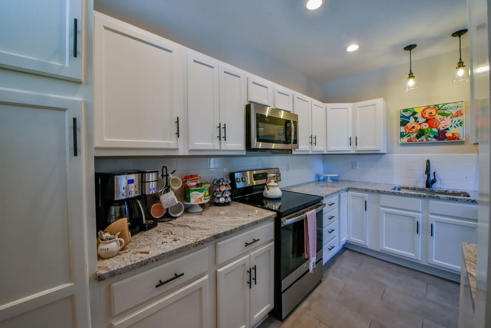 Kitchen - The kitchen has two types of coffee makers so you and your group can stay fully caffeinated during your stay.