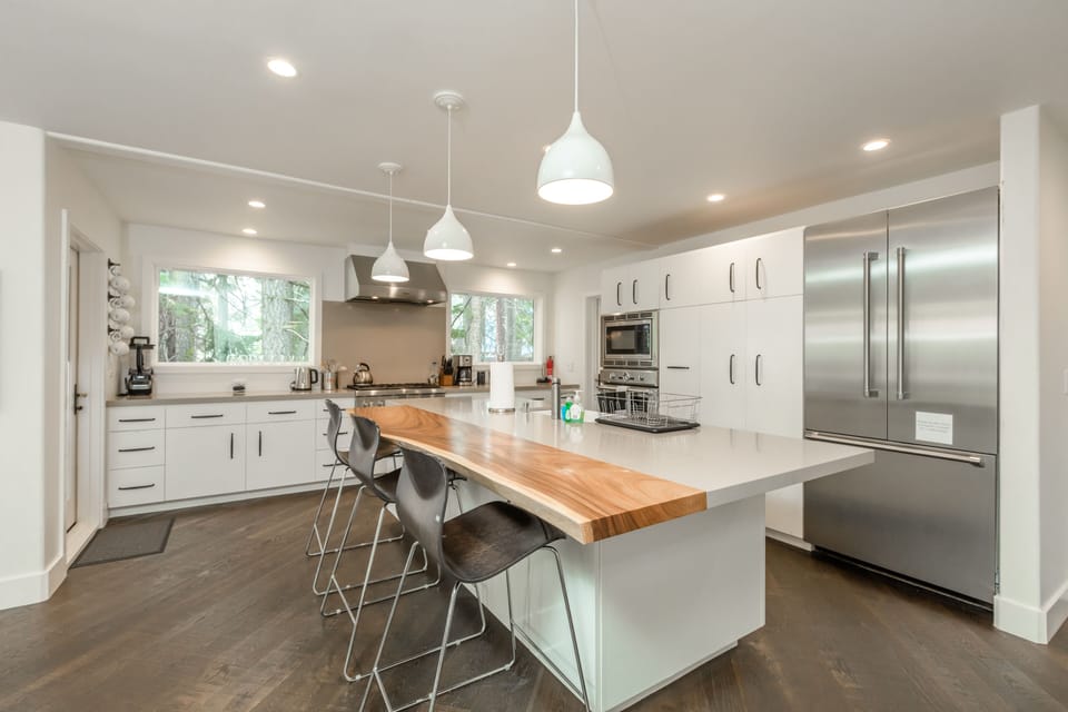Island With USB Outlets, Quartz & Wood Island, & High End Thermador Appliances
