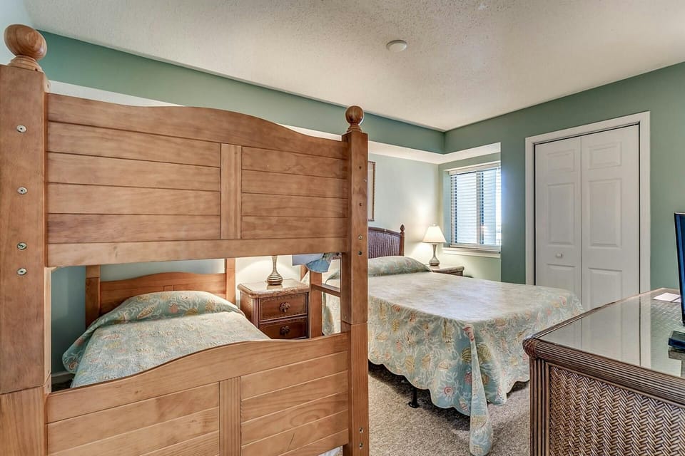 Third Bedroom with Twin Bunk Beds and a Quuen Bed 