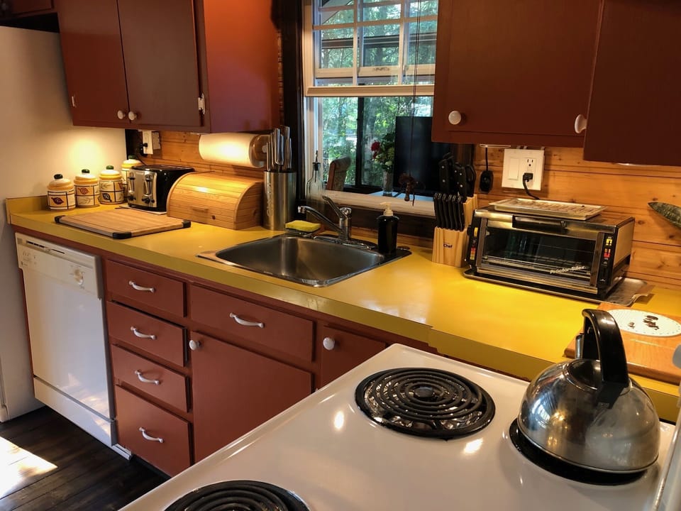 Kitchen with all amenities and appliances 