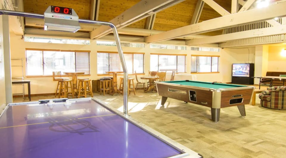  Play a game of pool or air hockey at the clubhouse game room