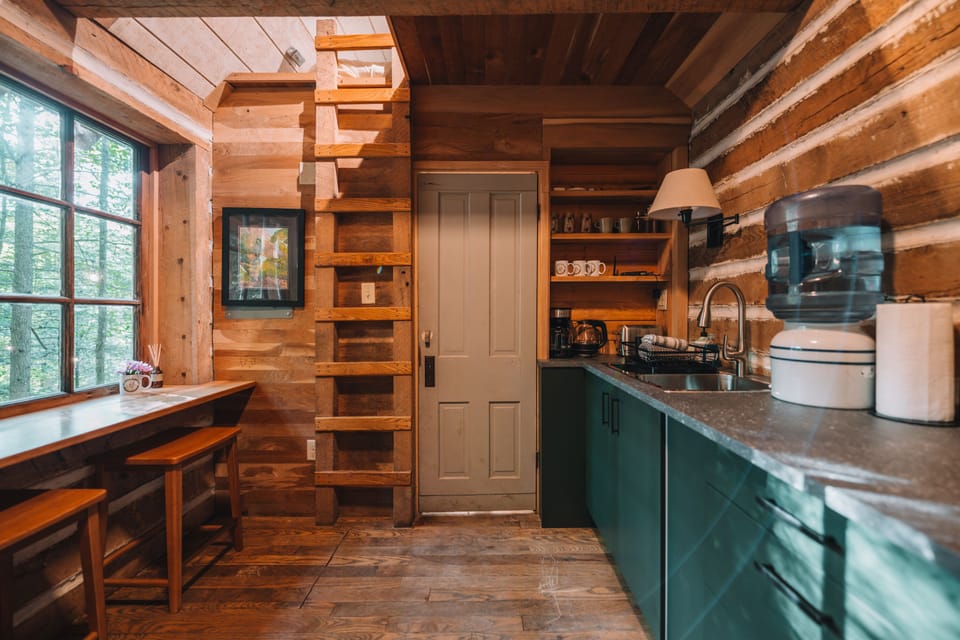 The Kitchen and door to the Bathroom