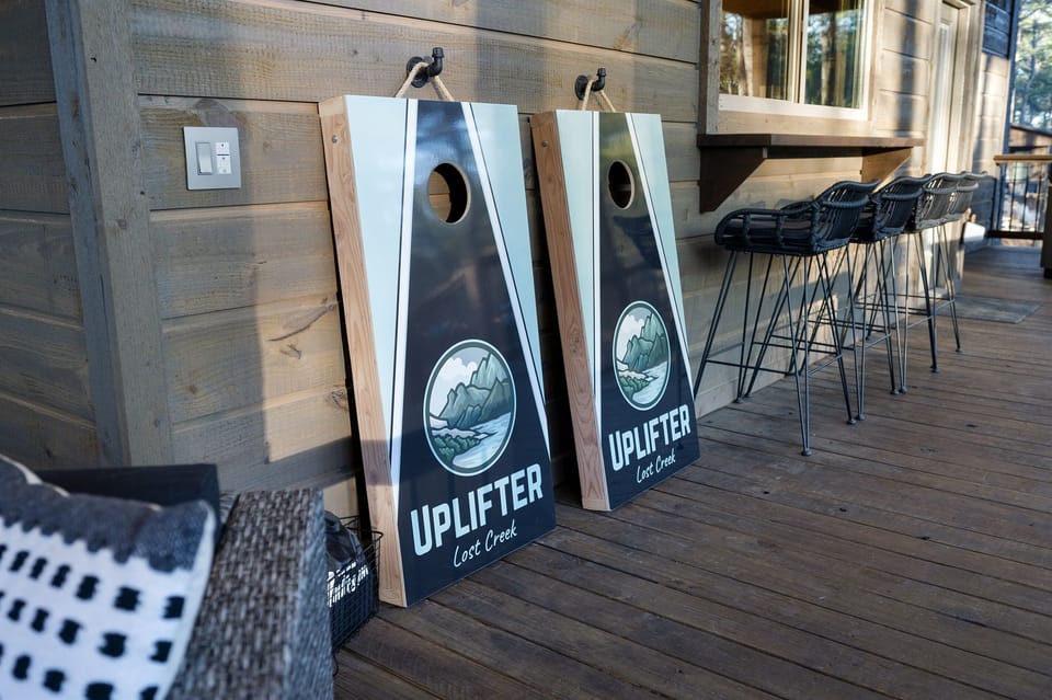 Cornhole boards ready for laid-back outdoor fun on the deck.