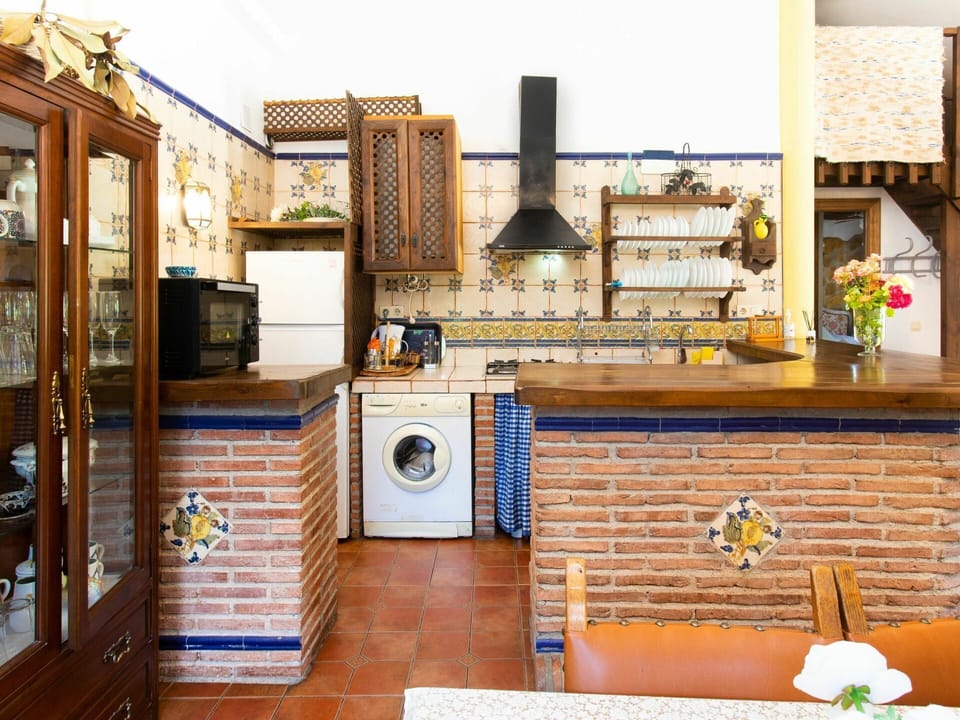 Property, Wood, Interior Design, Kitchen, Flooring, Wall, Floor, Building, Gas, Living Room
