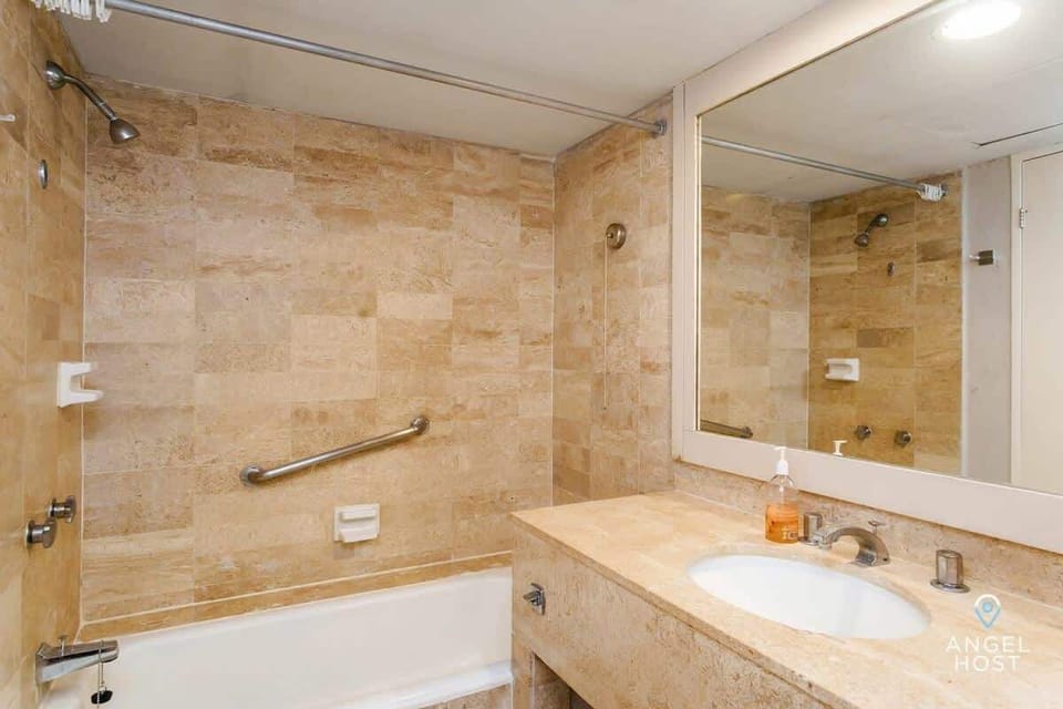 The shared full bathroom, available for Bedroom 2 and guests.