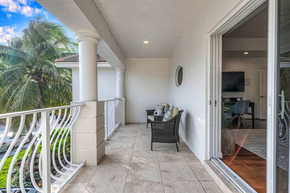 The patio is comfortable, with seating that overlooks the front of the house.