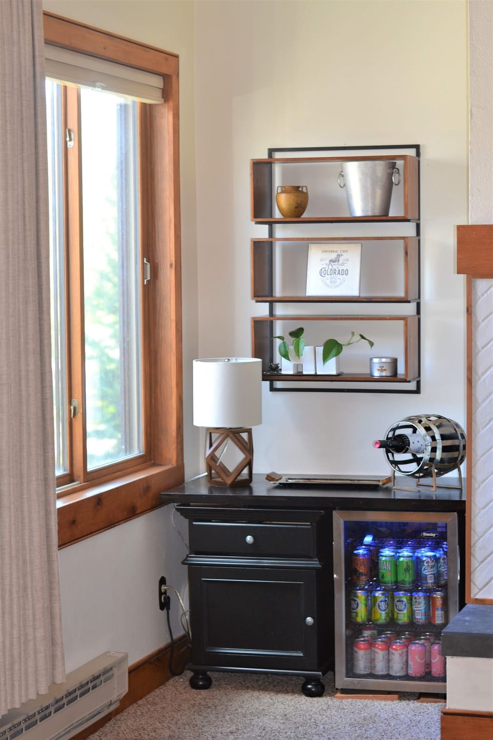 Relax and enjoy a beverage from the mini bar in the living room