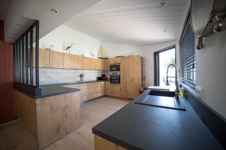 Kitchen open to the fully equipped living room