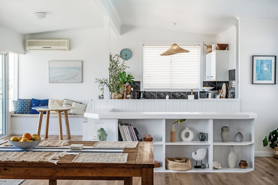 Open plan kitchen and dining with sea view