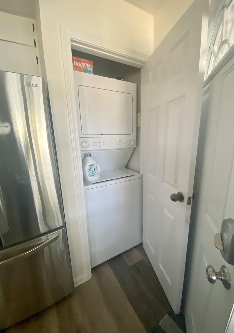 Stackable washer and dryer in kitchen