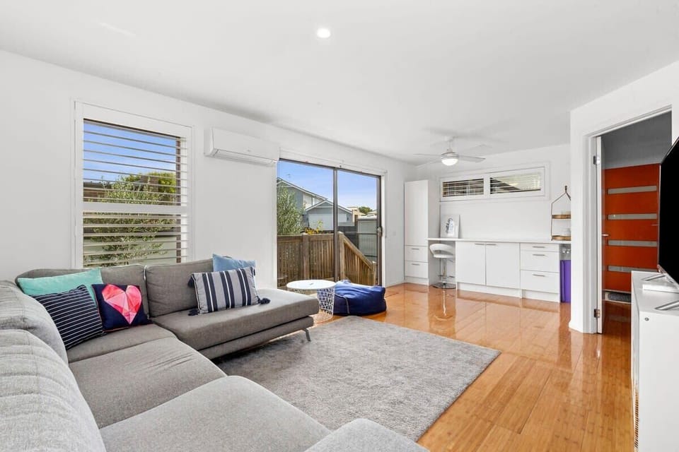  Downstairs is a recreational zone. This second living room is the perfect area for teens or children wanting their own space, with a comfy lounge suite and Smart TV.