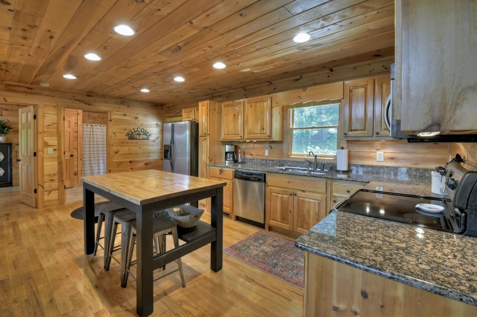 The Kitchen features a large island for preparing dinner and hanging out. 