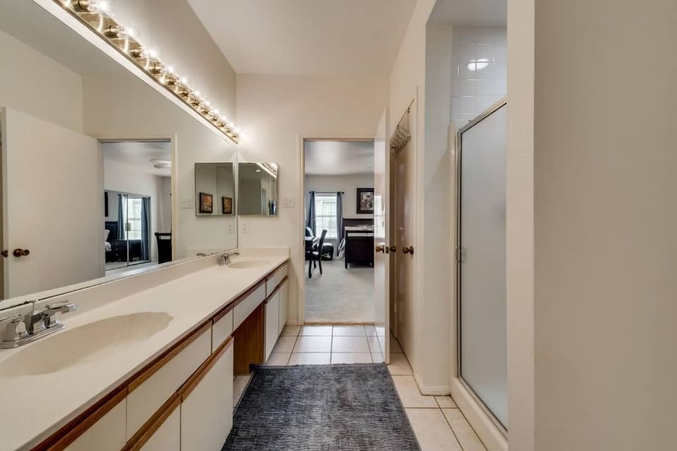 Primary Master Suite:
* King Size Bed
* Queen Mattress
* TV, Desk, & Hot Tub