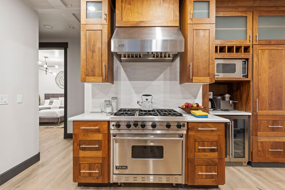 Whip up a gourmet meal in the chef's kitchen featuring high-end appliances, granite countertops, and a full range of cooking essentials for your Park City getaway.