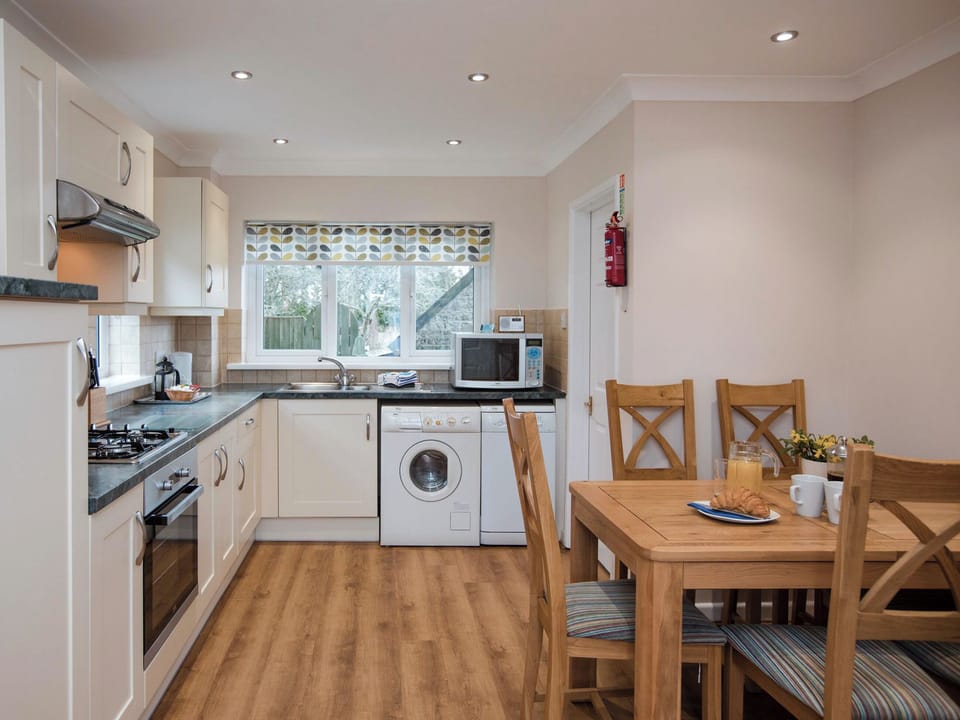 Kitchen/diner | Captain&rsquo;s Lodge - Celtic Haven Resort, Lydstep, near Tenby