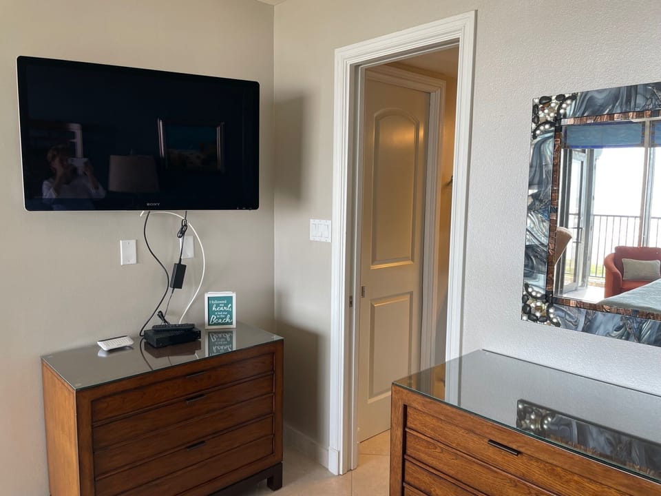 The Master Suite has a large TV and 2 dressers.