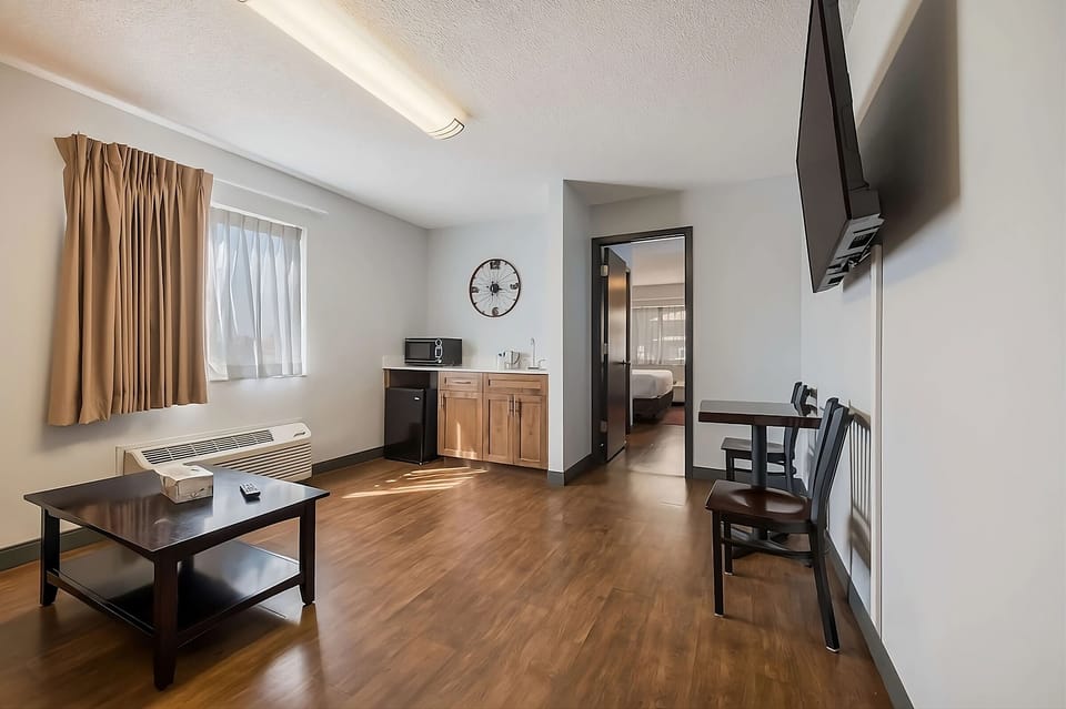 Start mornings easily with a handy kitchenette and simple dining nook.