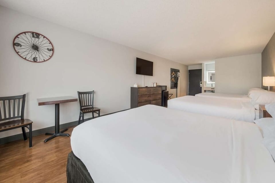 Wind down together in a spacious room with simple seating.