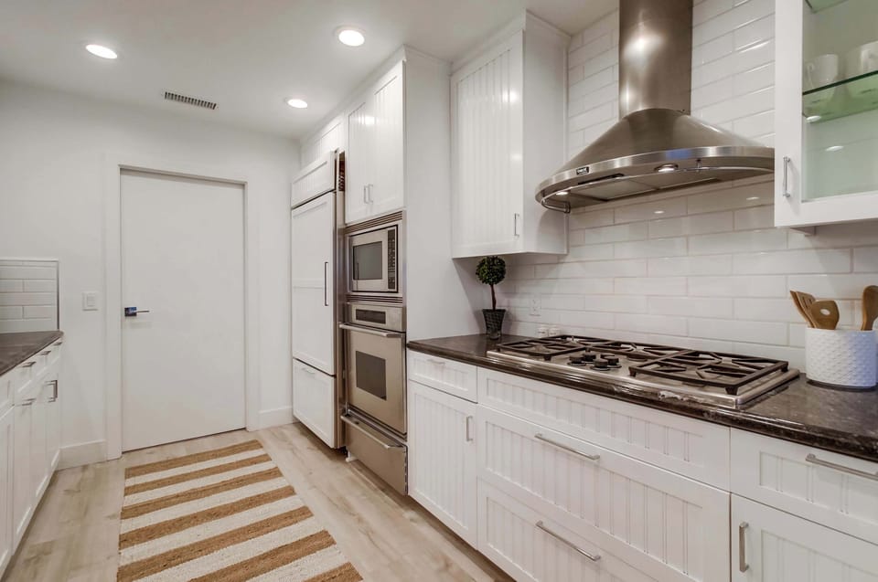 Kitchen | 5 Burner Stovetop | Warming Drawer | Oven | Microwave | Refrigerator