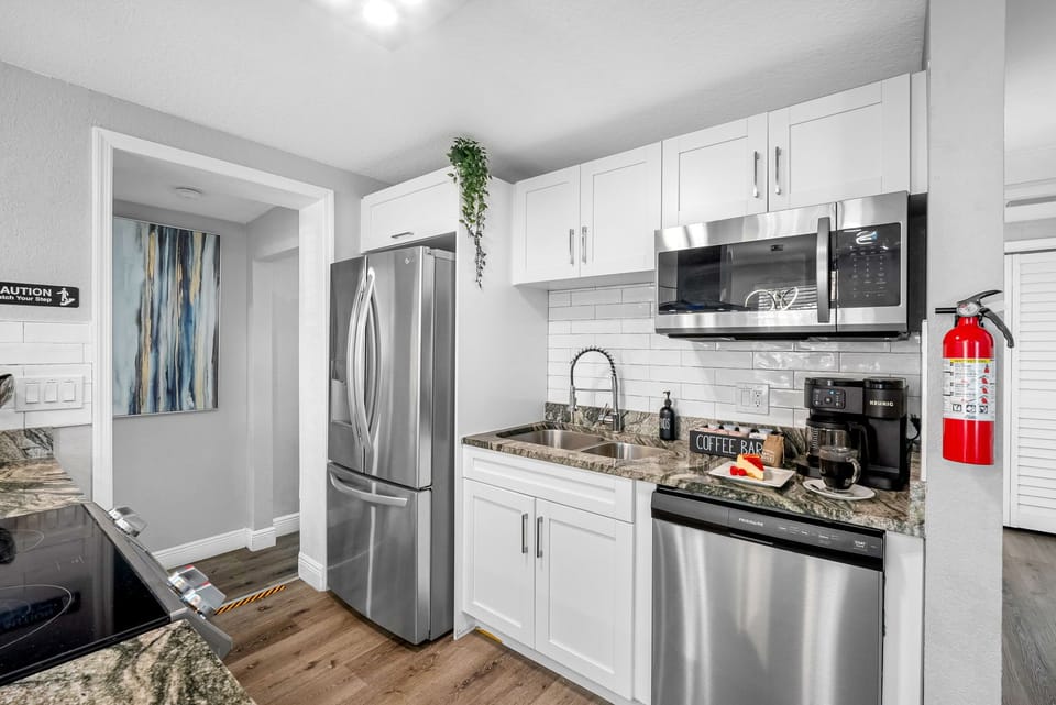 Enjoy a beautifully designed kitchen with modern finishes, pendant lighting, and a spacious island ideal for family gatherings.