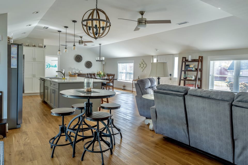 Enter into the open floor plan with updated kitchen, living, and family room.