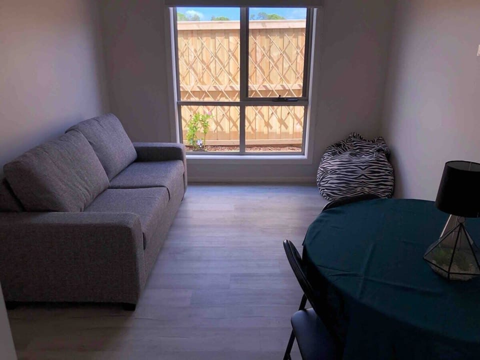 Additional living/small dining room adjacent to the kitchen, ideal for meals or board games