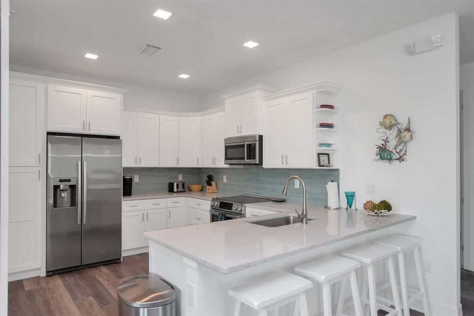 Modern kitchen with stainless steel appliances