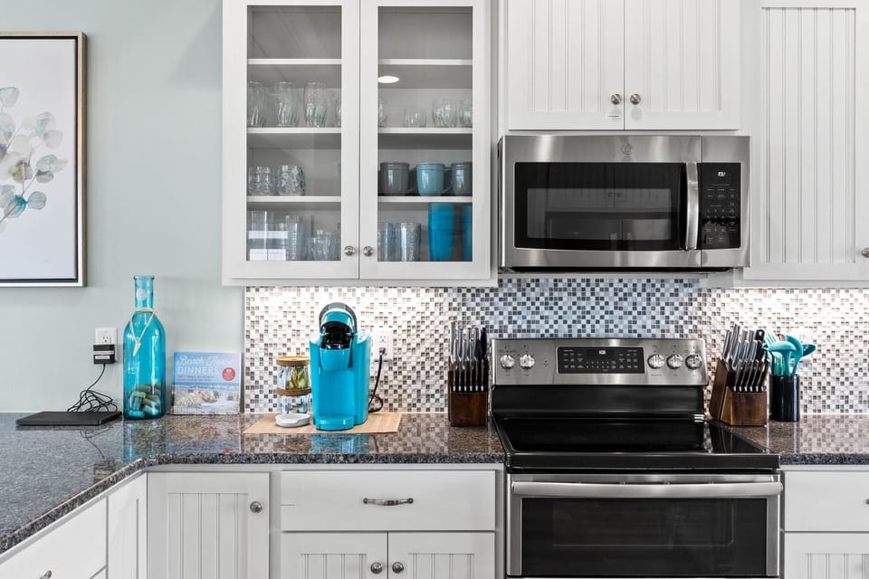 Kitchen with Keurig and drip coffee pot
