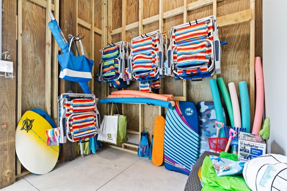 Fully stocked pool shed with 10 beach chairs, beach wagon, toys/boards and more