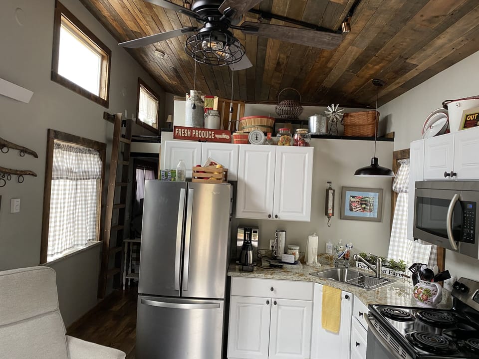 Full size refrigerator, stove and microwave.