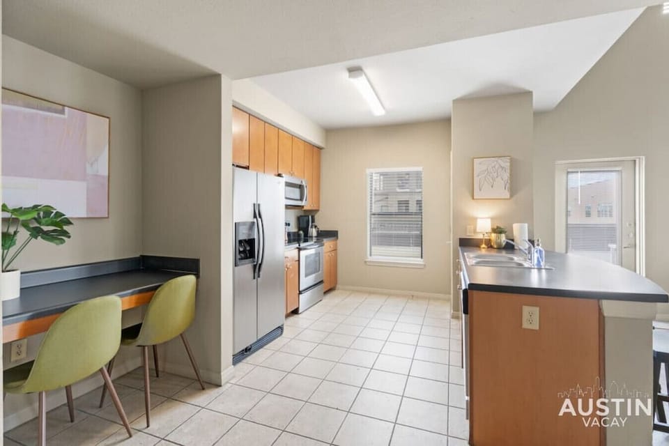 Kitchen with large island and bar seating