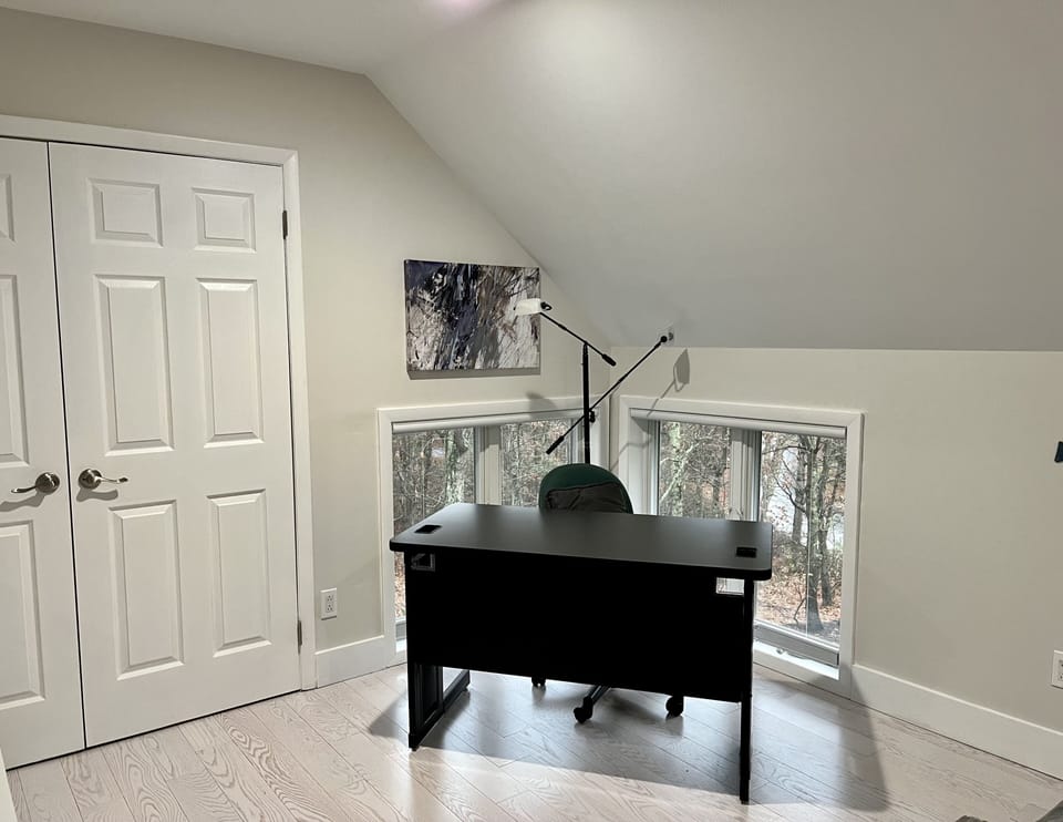 Dedicated workstation in bedroom 3. Doors shown lead to large double closet.