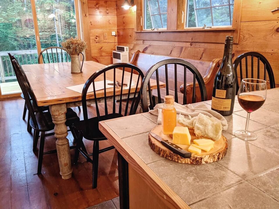 Our large dining table comfortably seats 8 guests and is an extension of our open kitchen.