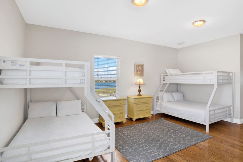 Bedroom 8 - Has a TV, private bathroom, balcony access and 2 Twin over Full Bunk Beds - Sleeps 6