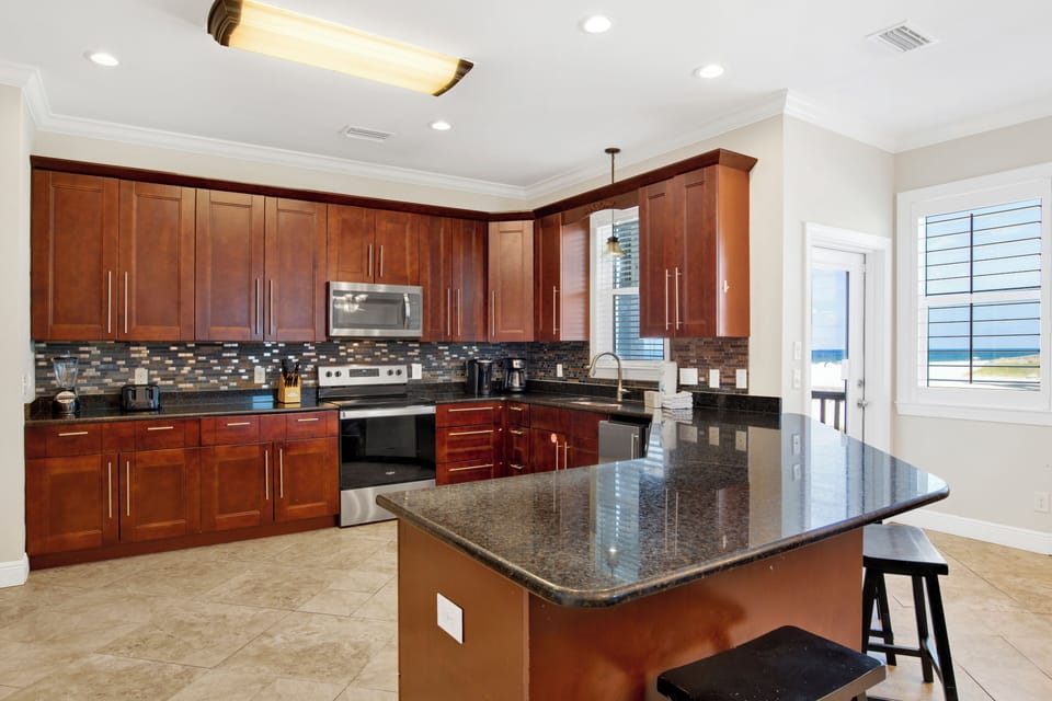 The spacious kitchen is fully equipped