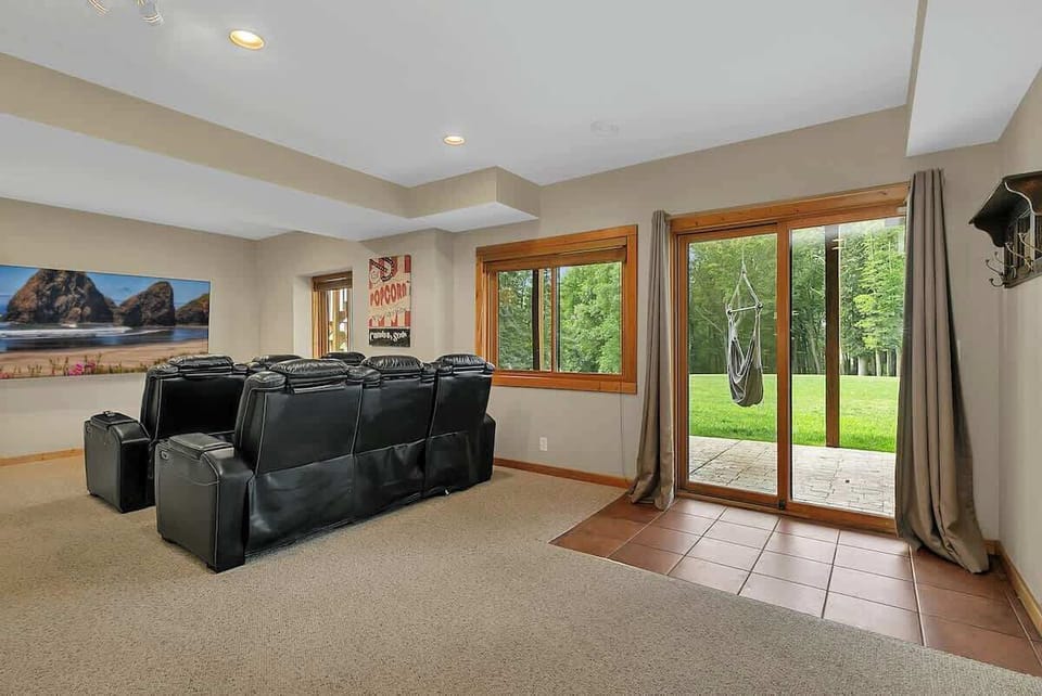 82" smart tv and theatre seating.