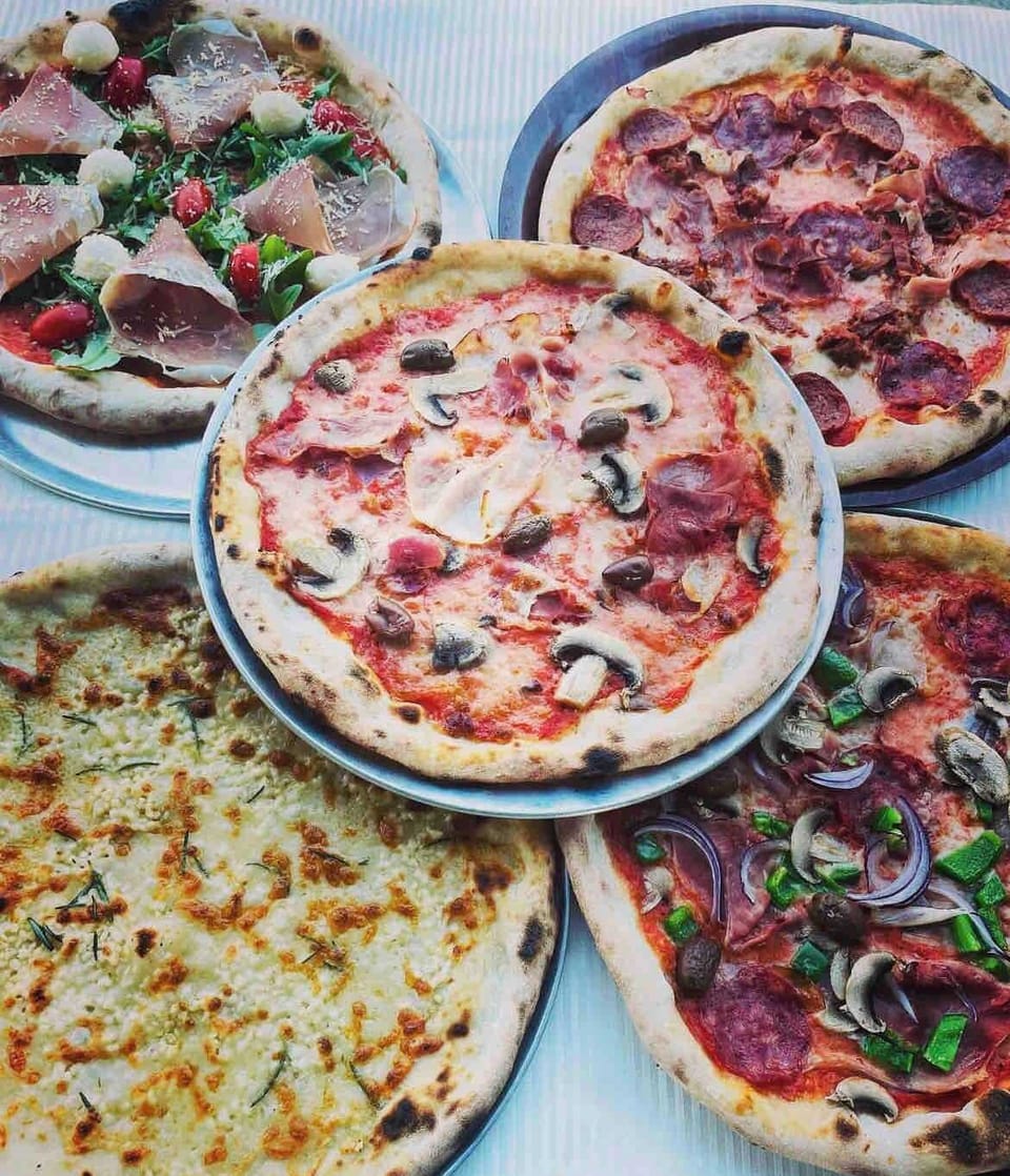 Enjoy making homemade pizzas with your family with our woodfire /propane outdoor pizza oven!  (Wood not provided)