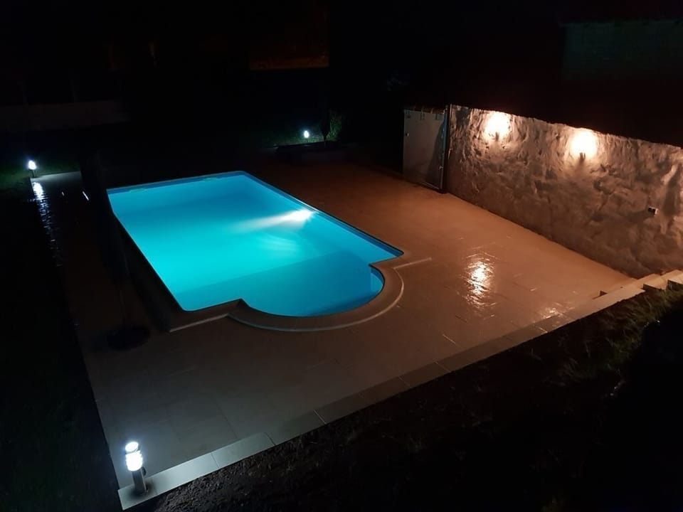 The new Pool at night. It's heated, and just for you