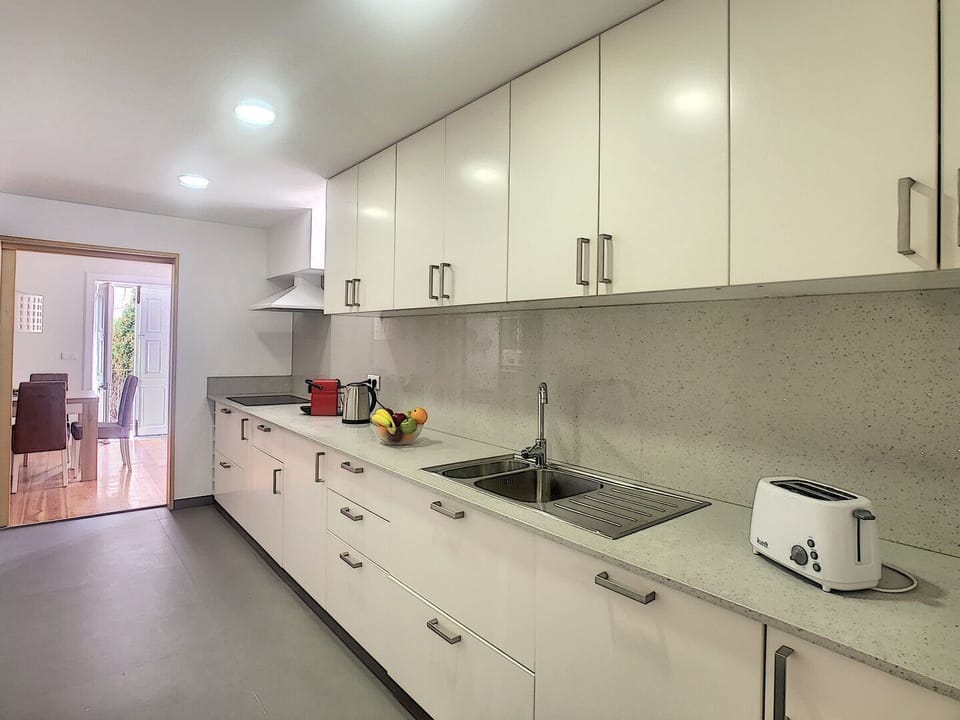 Sleek and functional modern kitchen for culinary enthusiasts #nespresso #toaster #modern