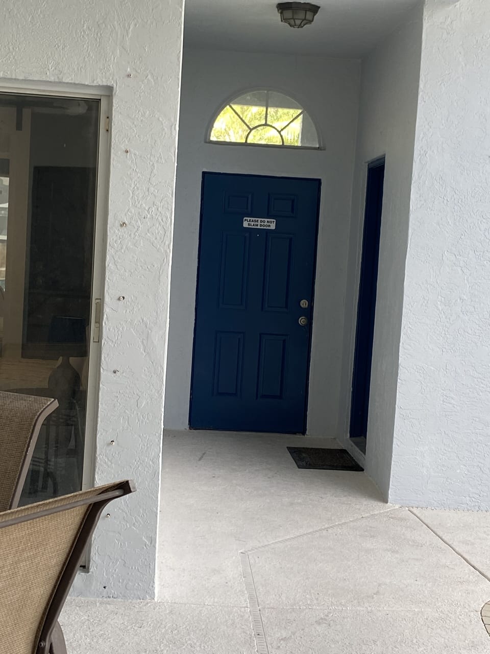 front entry door looking from pool area,  your doo on the right