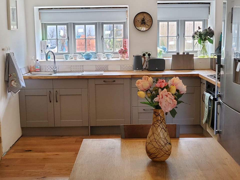 Fully equipped country kitchen with dishwasher and coffee maker